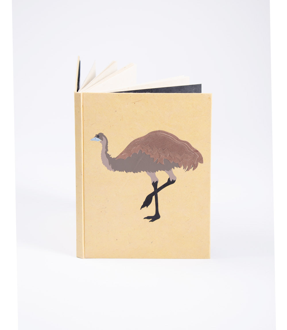 Notebook with an emu illustration on a beige cover against a white background