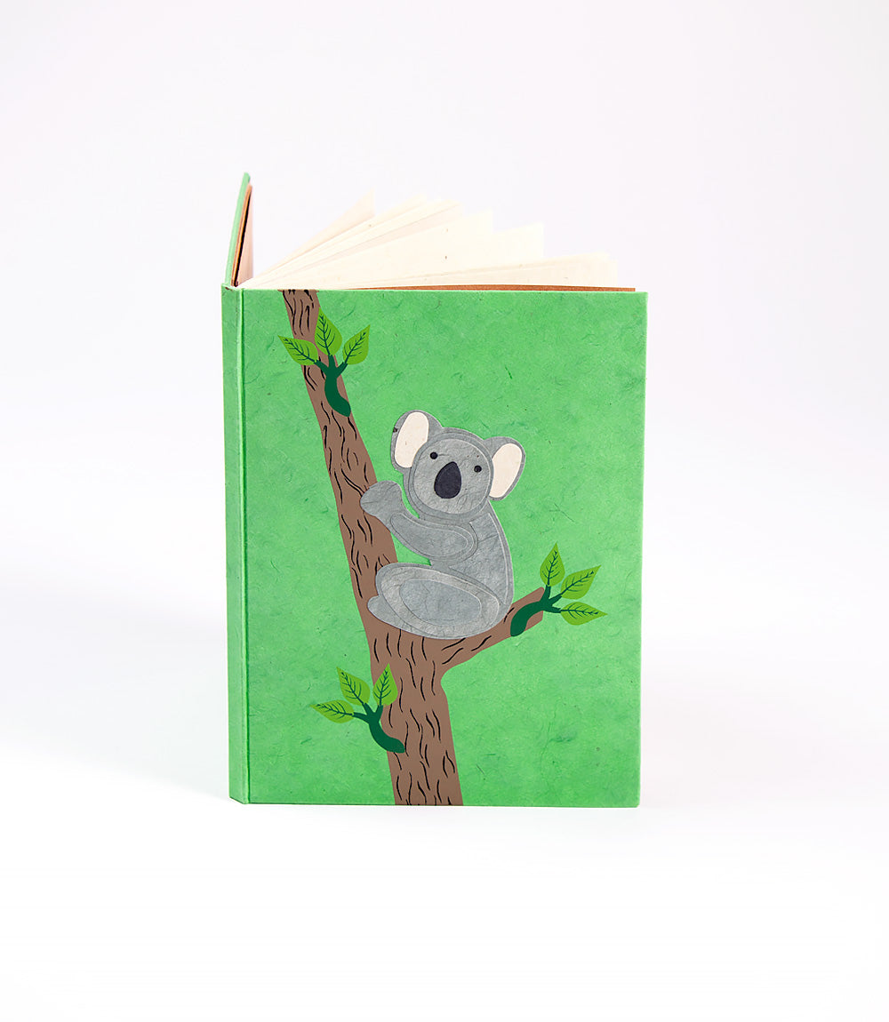 Notebook with a koala illustration on a green cover