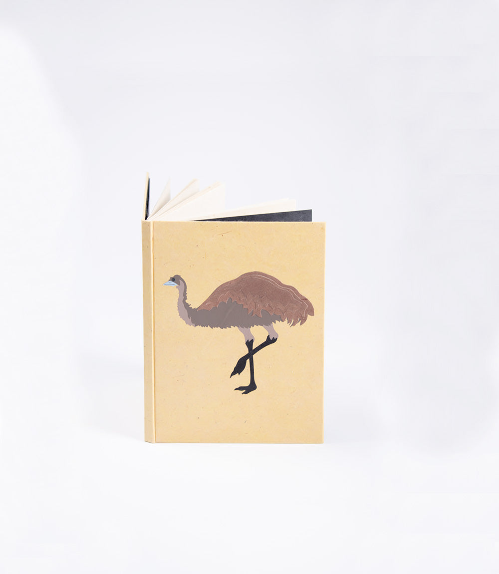 Notebook with an emu illustration on a beige cover against a white background