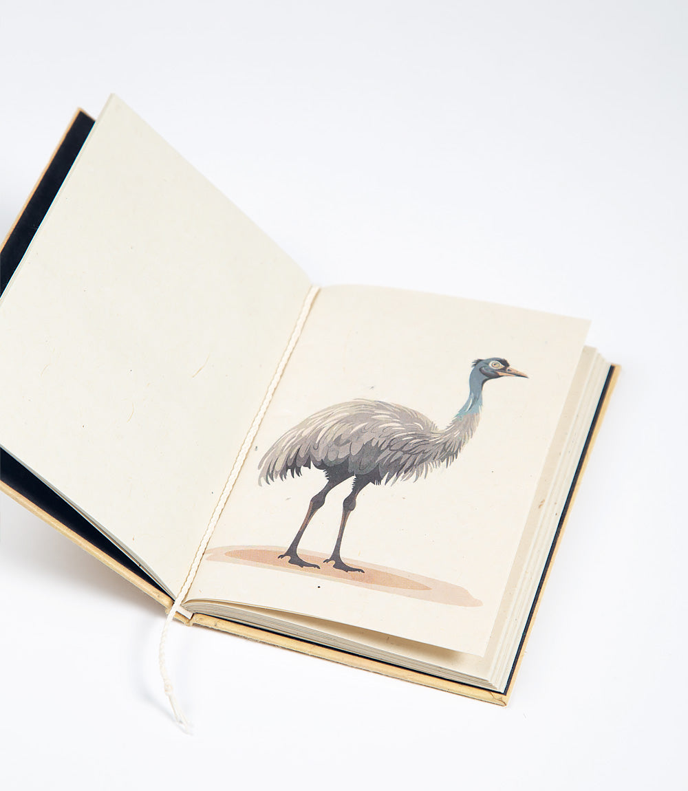 Open book with a illustration of an emu on a white background
