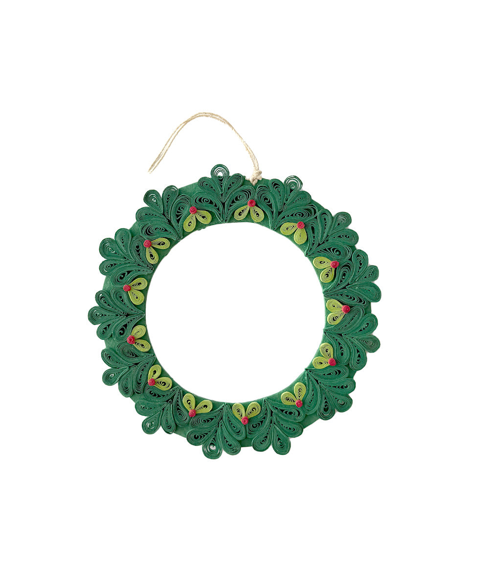 A green, red, and white quilled Christmas wreath with a gold hanging loop.