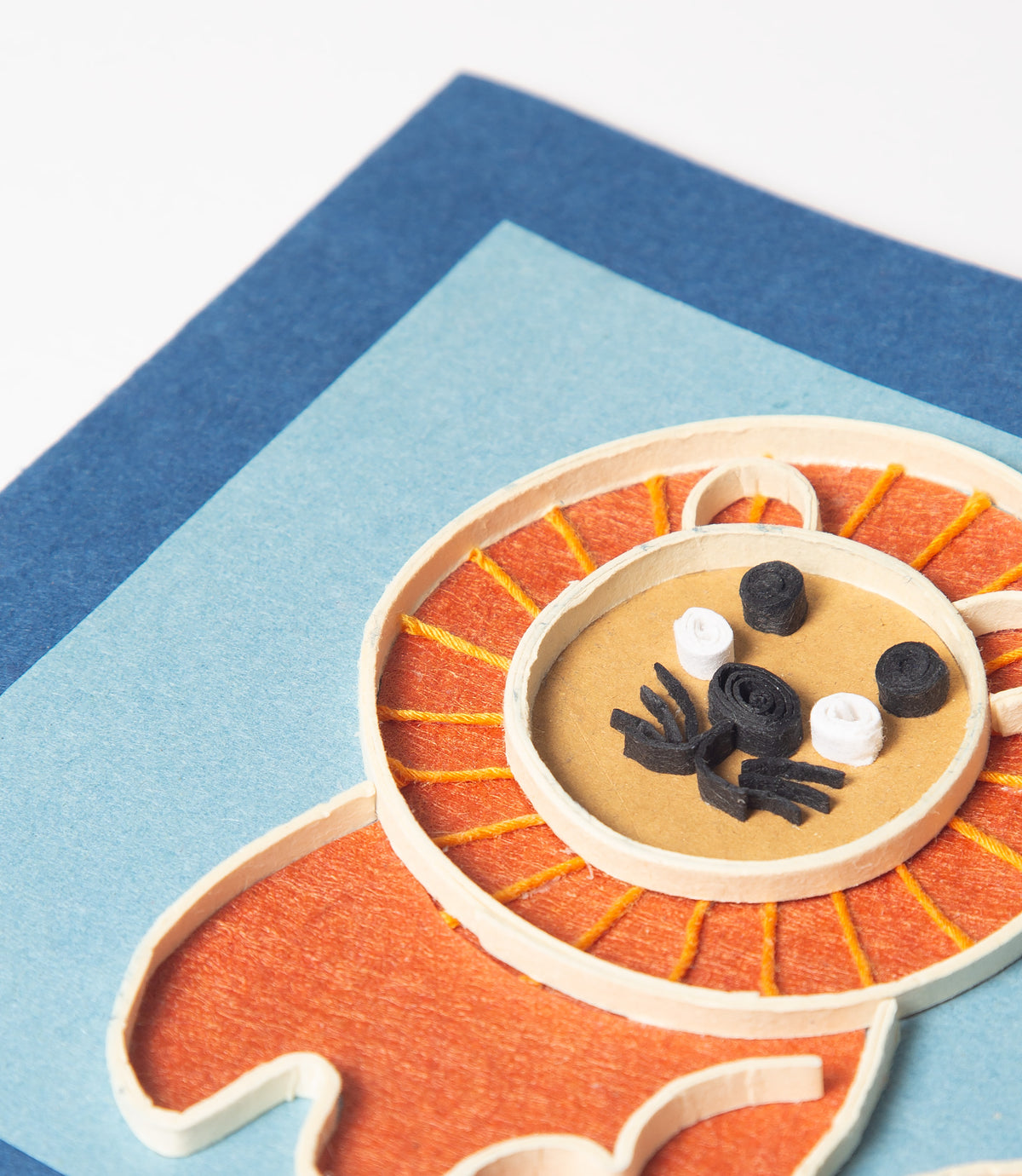 Card with a lion design on a blue background