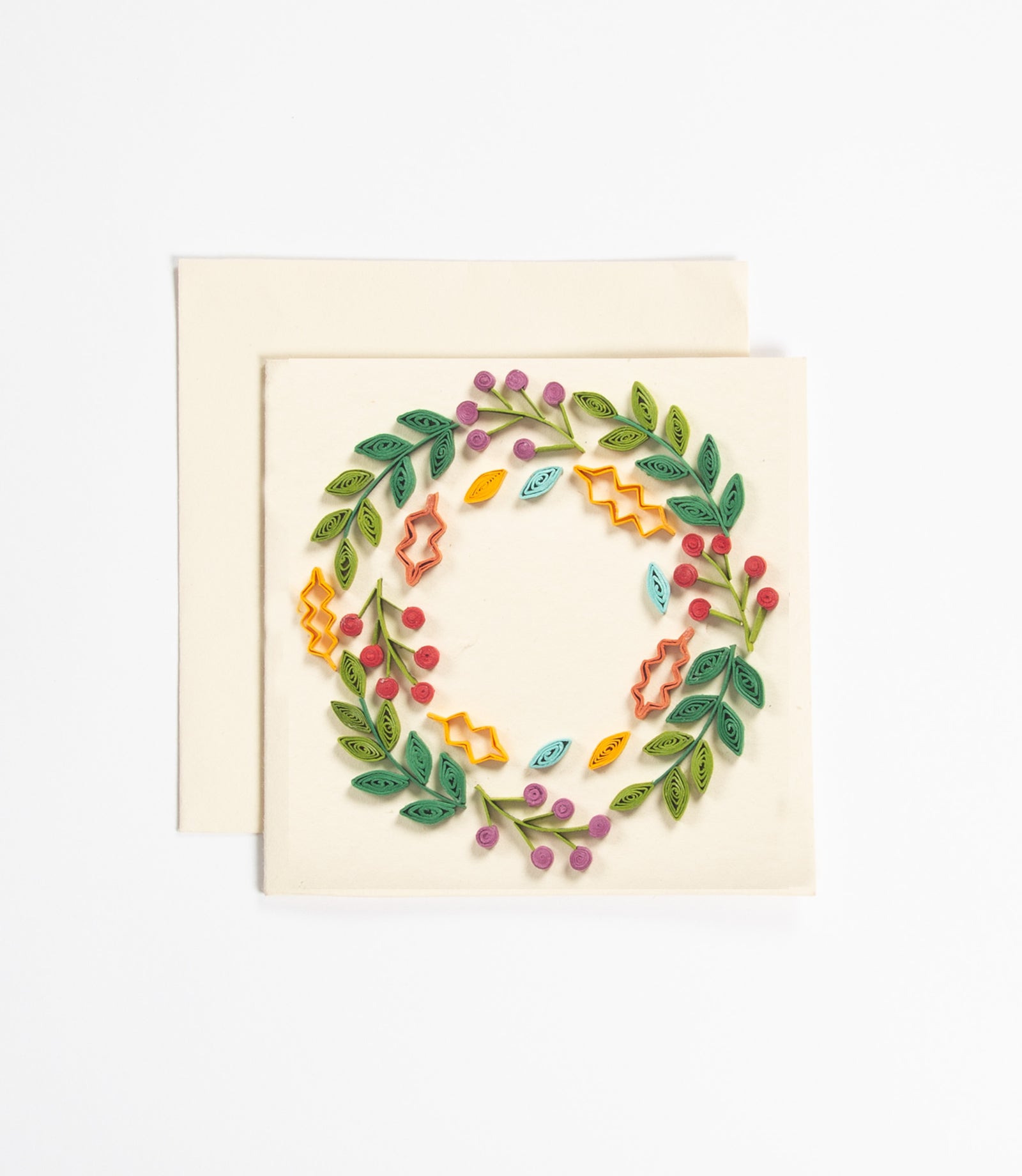 Decorative card with a floral wreath design on a beige background