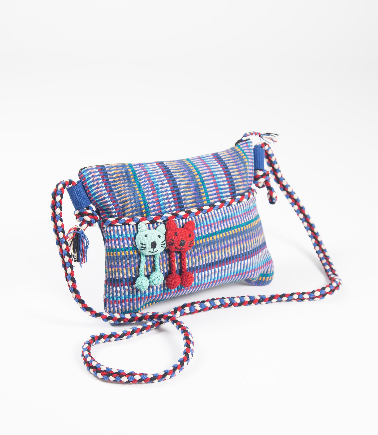 Colorful striped crossbody bag with decorative kittens on a white background