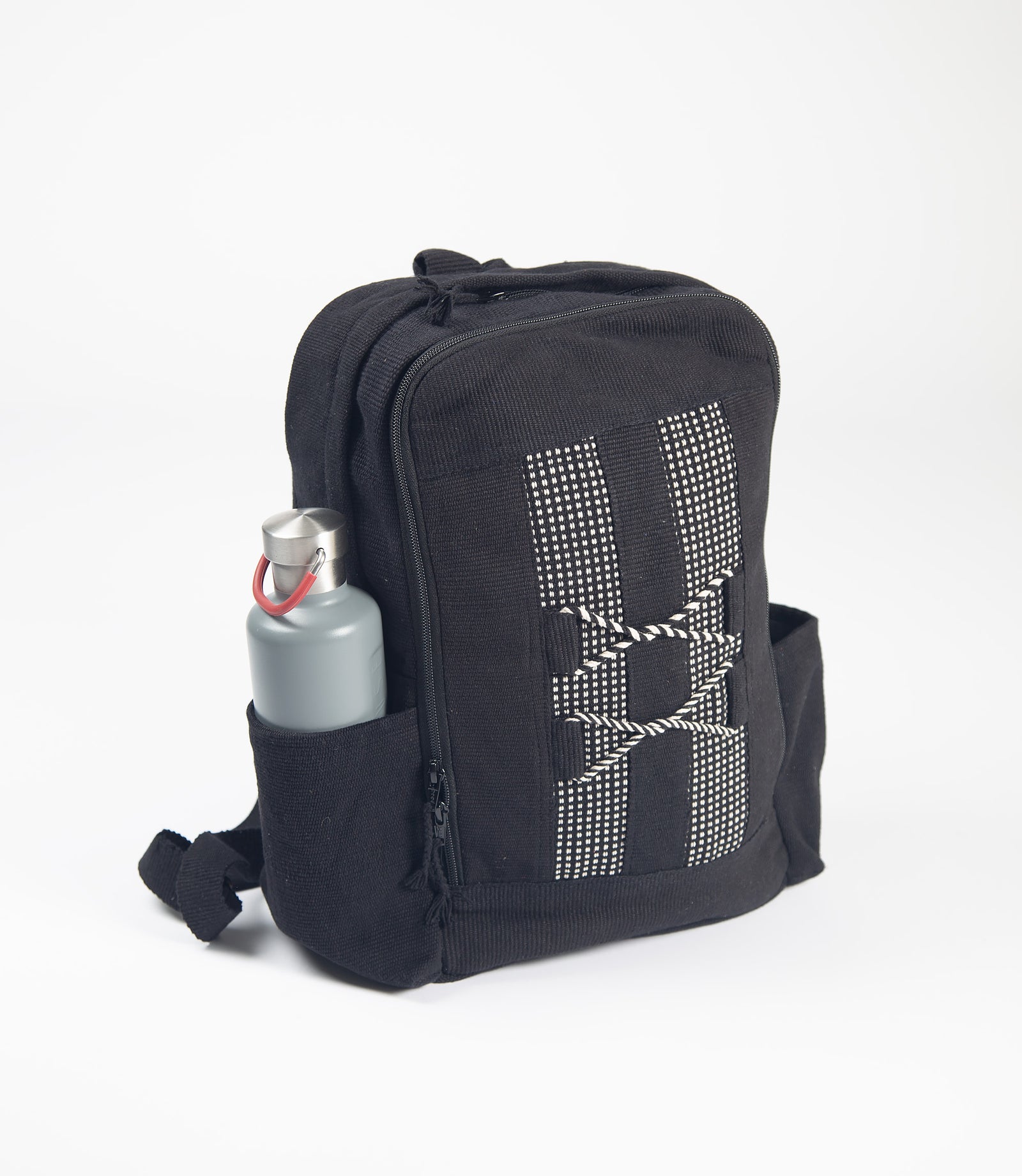 Black backpack with a water bottle in a side pocket on a white background