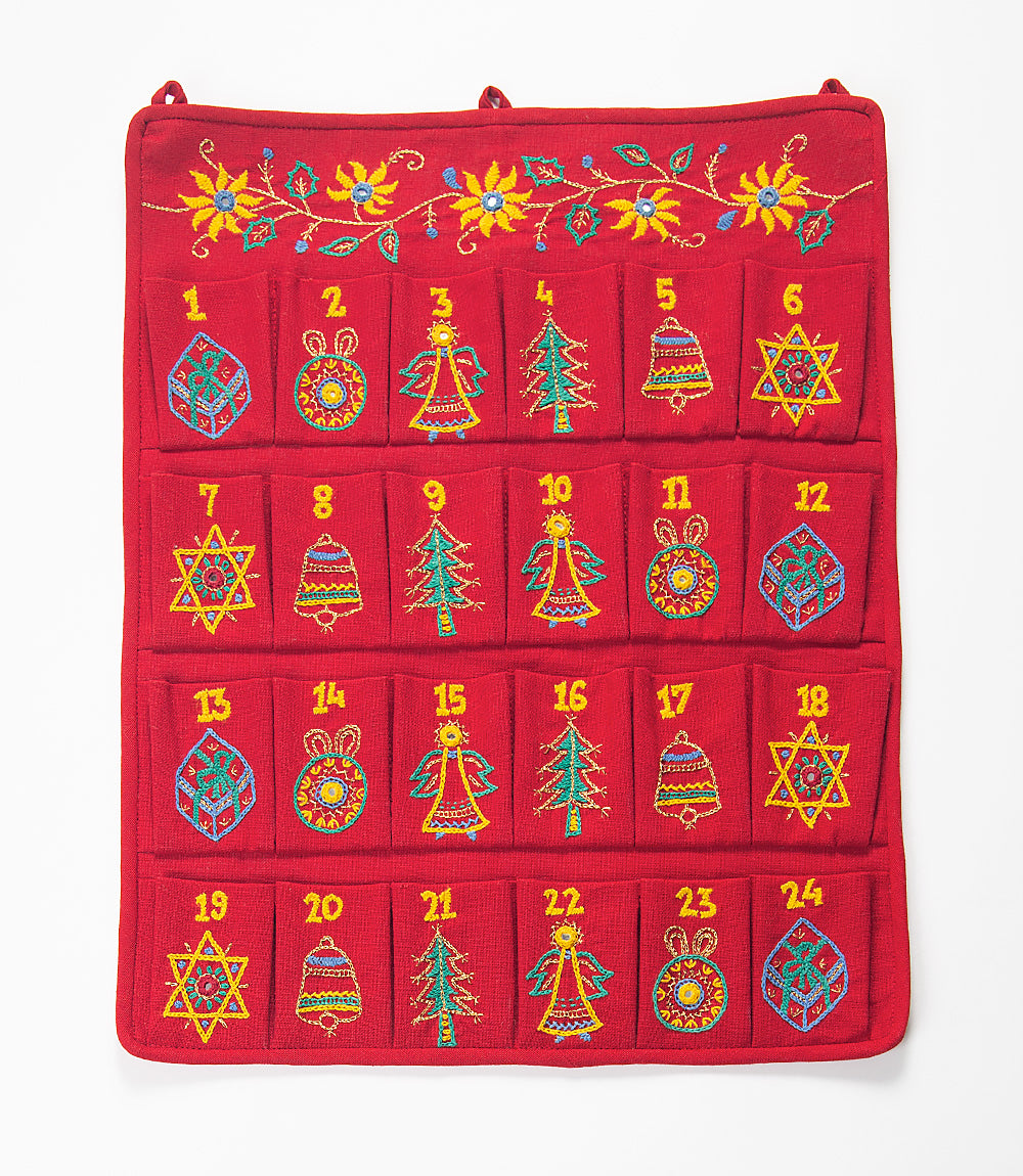 Red advent calendar with colorful designs on a white background