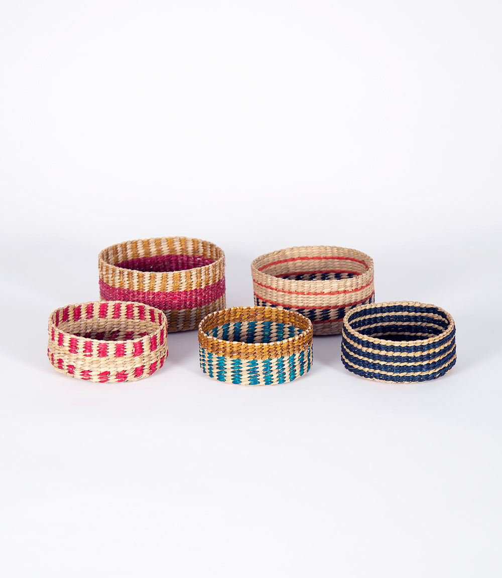 Set of small pathi grass baskets.